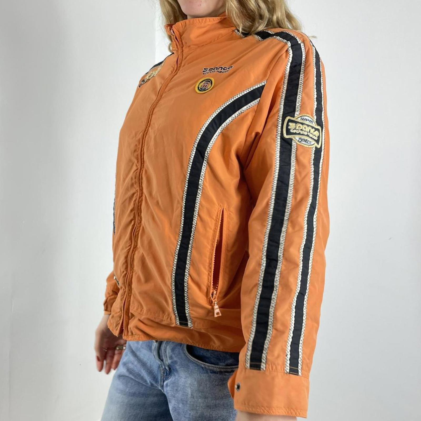 Orange racer windbreaker jacket with graphic detailing