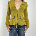 Vintage green avant garde zip up jacket with embroided details on the back and pockets.