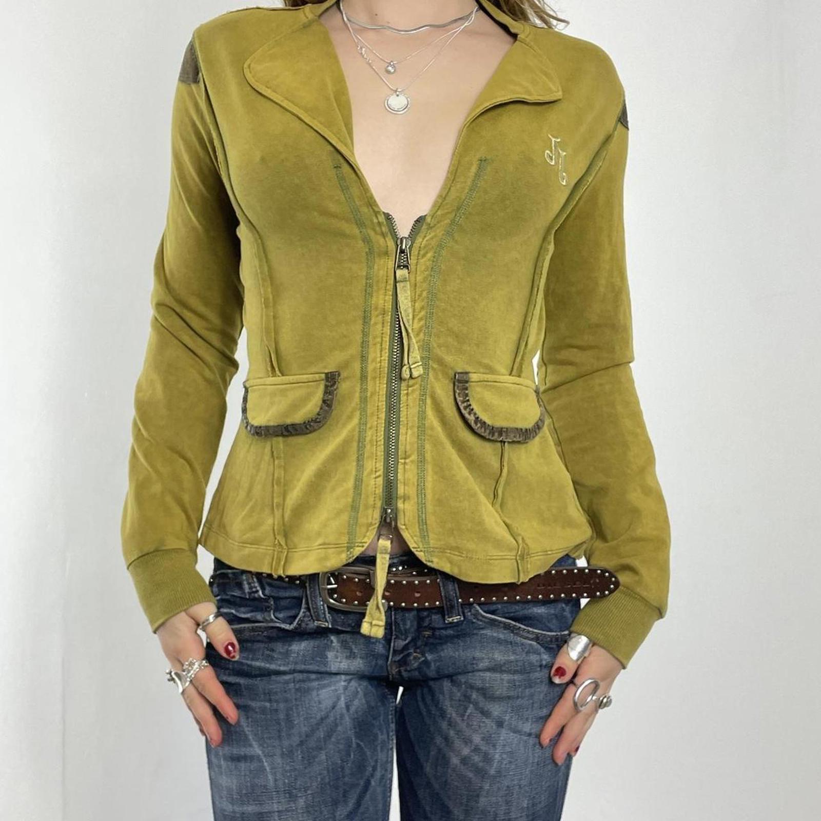Vintage green avant garde zip up jacket with embroided details on the back and pockets.