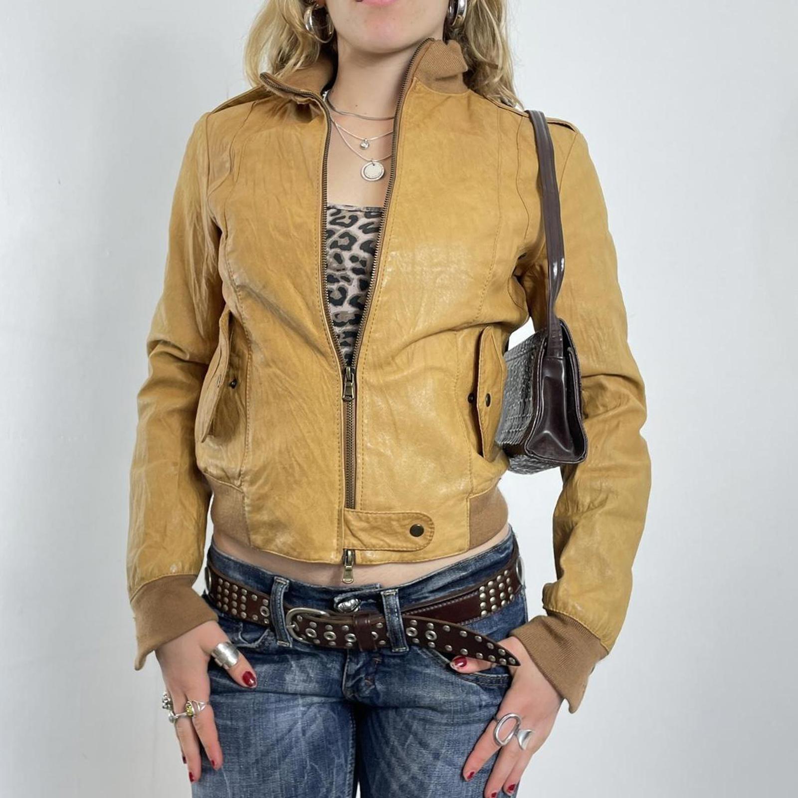 Vintage mustard fitted leather jacket with thick waist band, cool pockets.