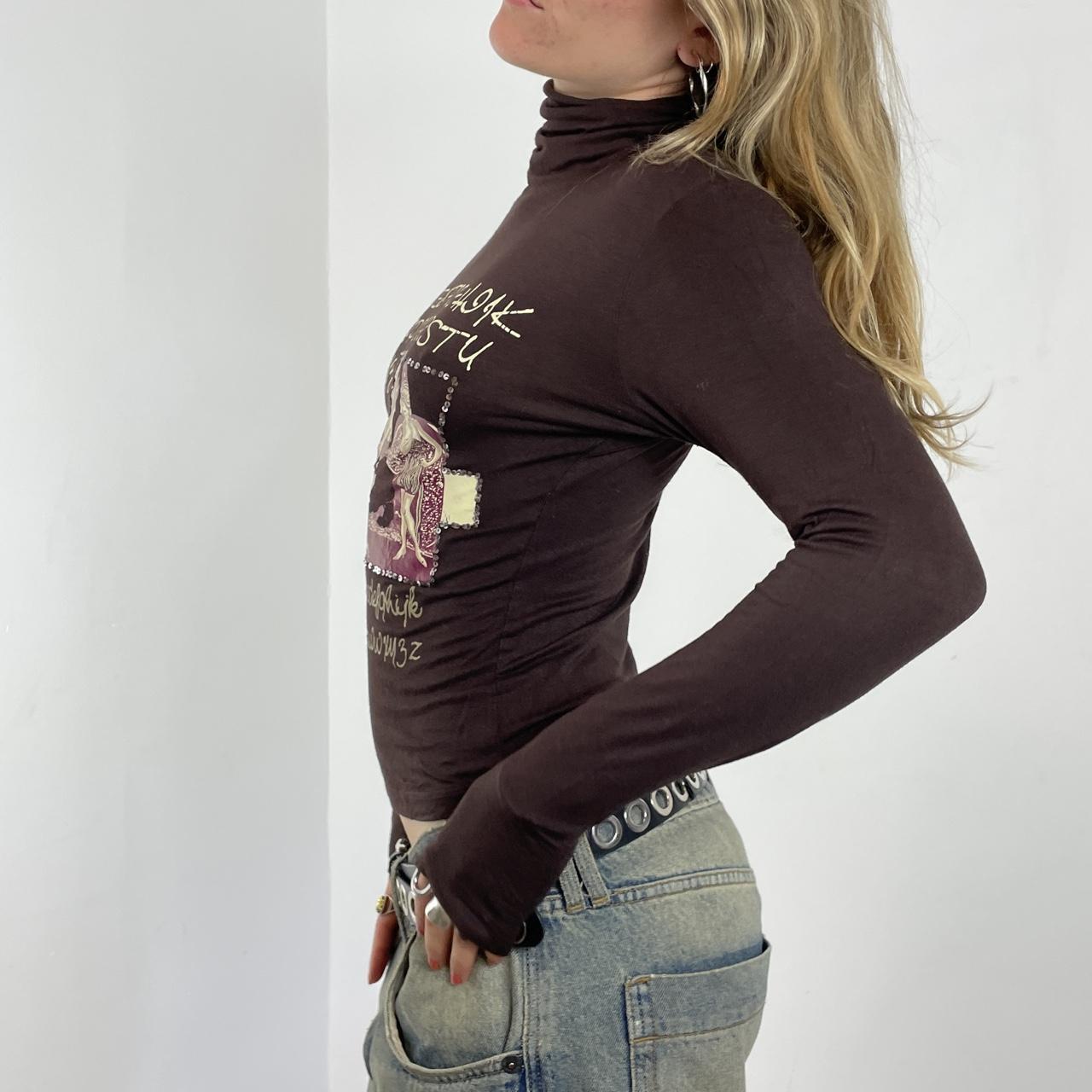 Graphic soft high neck long sleeve top with bold patterning on the front
