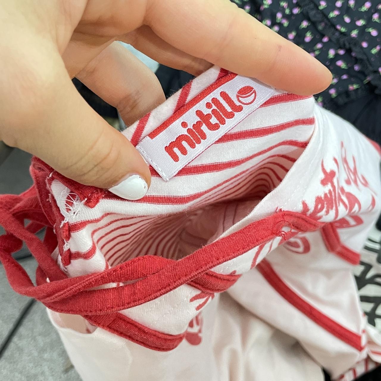 Red and white graphic alternative multi - tie top